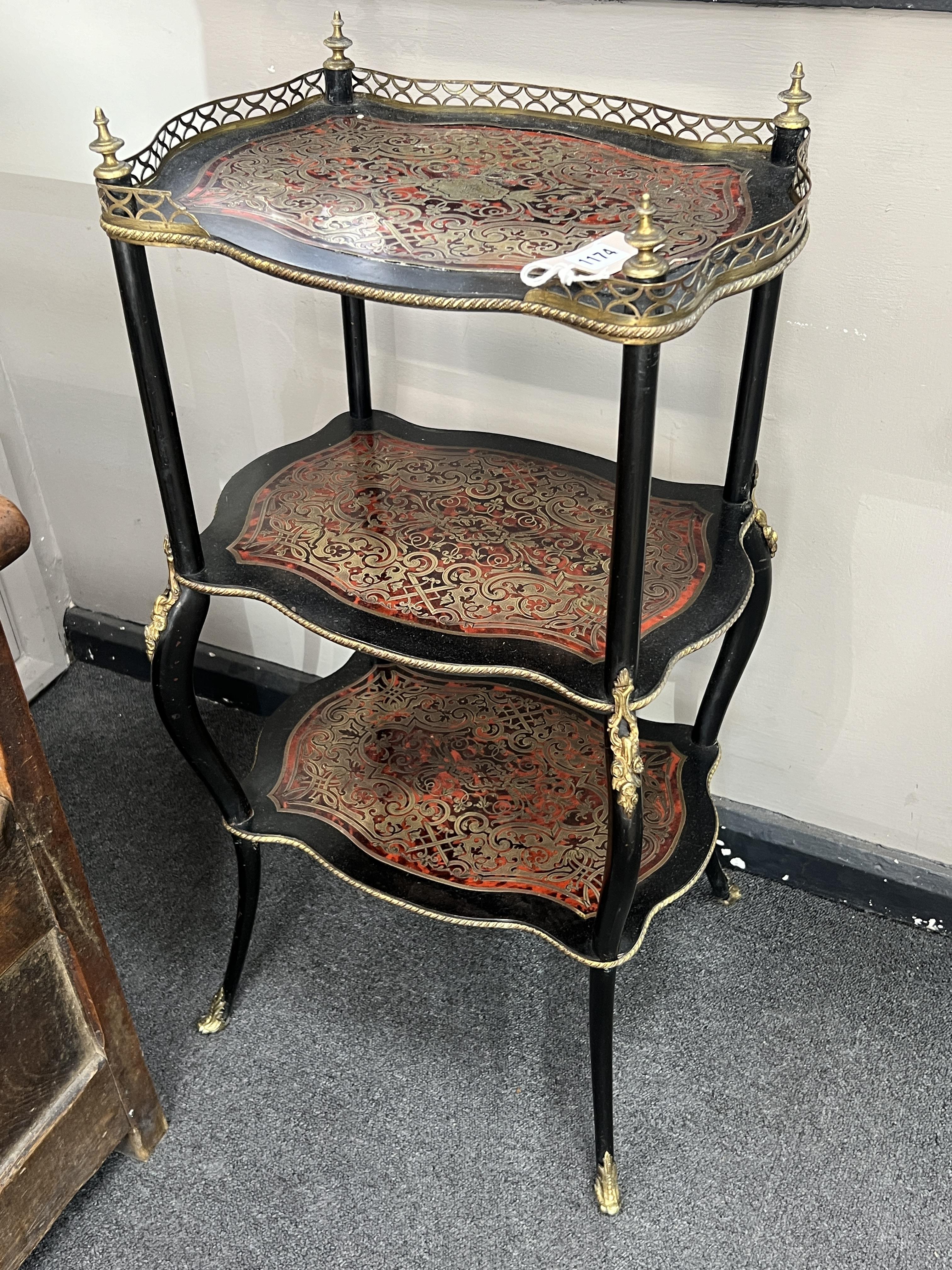 A Napoleon III boulle worked three shelf etagere, width 41cm, depth 29cm, height 82cm